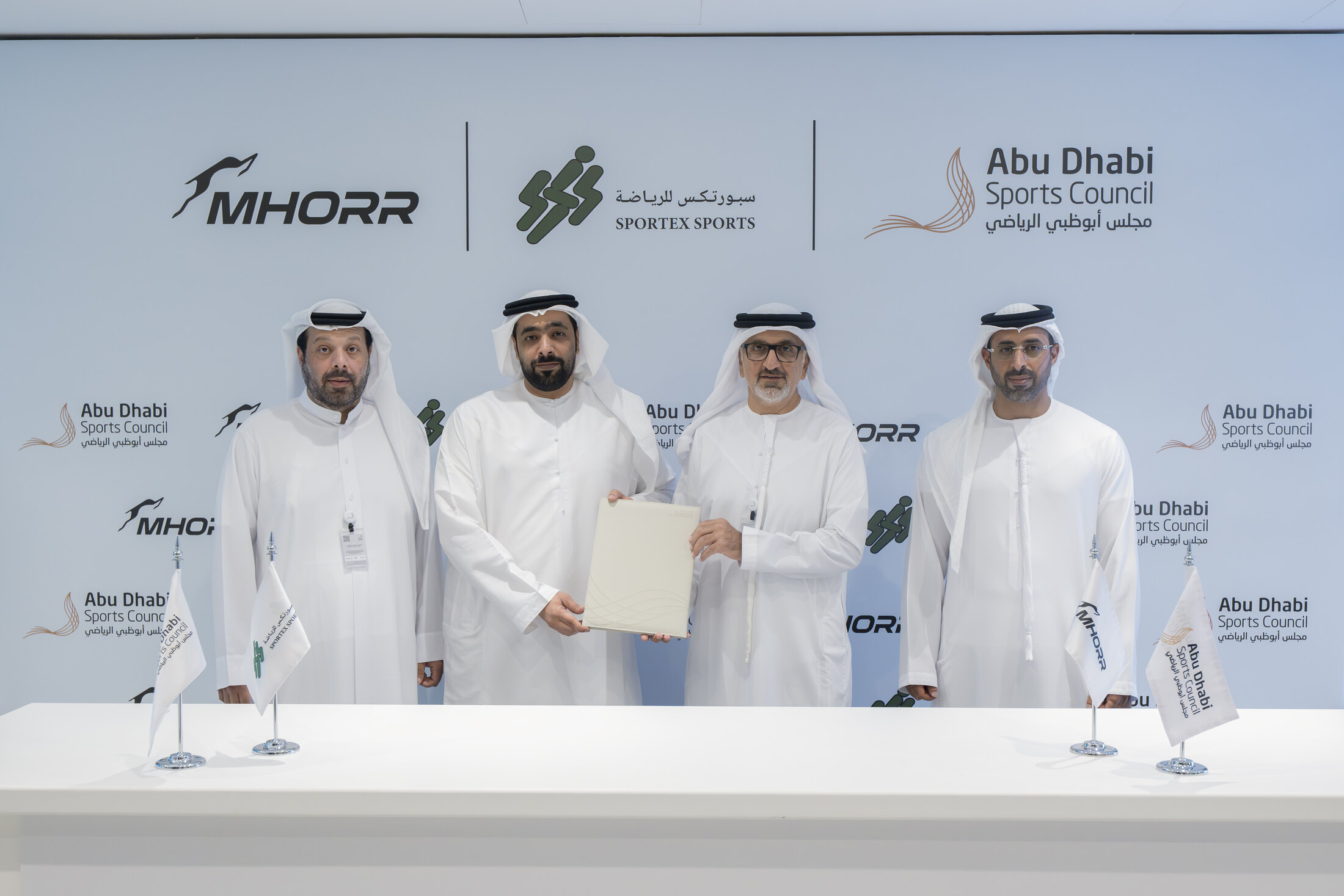 Representatives of Sportex Sports and Abu Dhabi Sports Council following the partnership signing